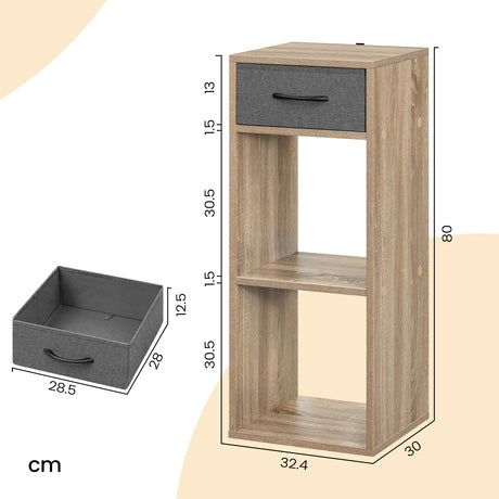 BukkitBow compacte boekenkast met drie niveaus en stoffen lade, wit houtlook, geschikt voor woonkamer of slaapkamer.