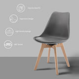 Set van 4 draaibare BukkitBow eetkamerstoelen van massief hout met ronde zittingen en rugleuningen, elegant en stevig design.