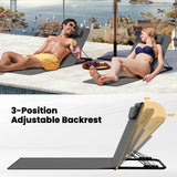 Gevulde BukkitBow strandmat met verstelbare rugleuning en hoofdkussen, geschikt voor comfortabel loungen op het strand.