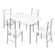 Industriële eethoek van BukkitBow met houten tafel en vier bijpassende stoelen in compact design.