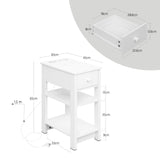 Wit BukkitBow nachtkastje met stopcontact en USB-poort, smal design, modern stijl en compact formaat voor naast het bed.