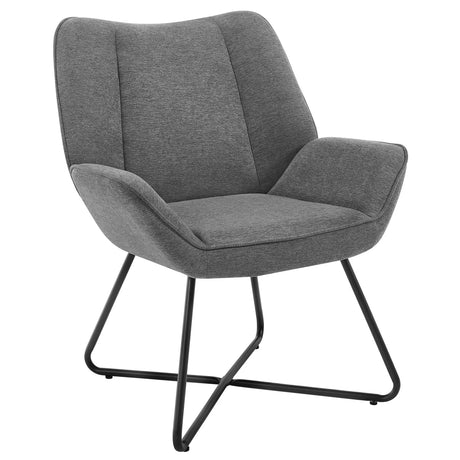 Moderne linnen fauteuil van BukkitBow met X-vormig onderstel, comfortabele zithouding en stijlvol design.