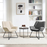 Moderne linnen fauteuil van BukkitBow met X-vormig onderstel, comfortabele zit en strak design voor in de woonkamer.