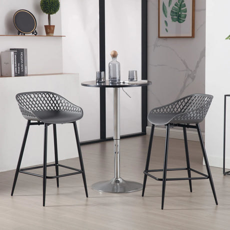 Set van 2 moderne kunststof barkrukken van BukkitBow met open rugleuning, strak ontwerp en comfortabele zit.