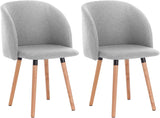 Moderne linnen eetkamerstoel van BukkitBow met massief houten poten, comfortabele zitting en strakke design.