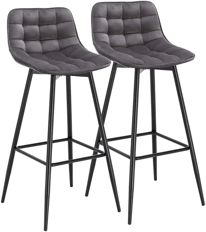 BukkitBow barkrukken met leren of fluweel bekleding, metalen onderstel, ergonomisch ontwerp en rugleuning, zithoogte 64,5 cm.