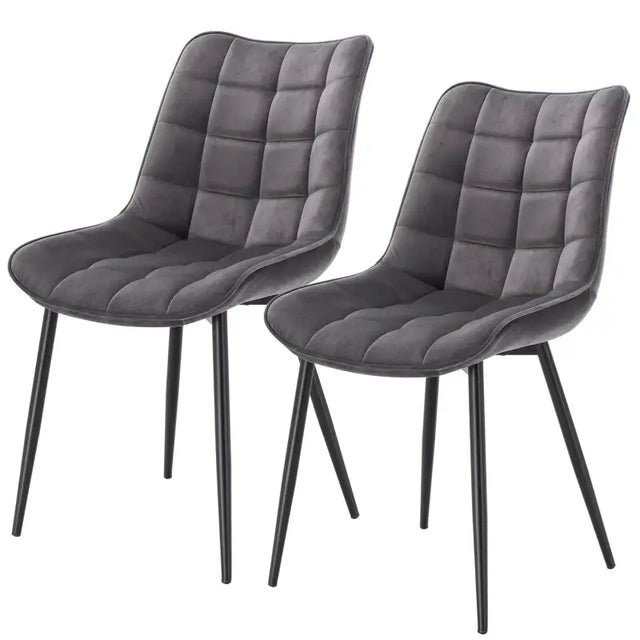 Set van 2 BukkitBow eetkamerstoelen met leren, stoffen en fluwelen bekleding, metalen poten en ergonomisch ontwerp.