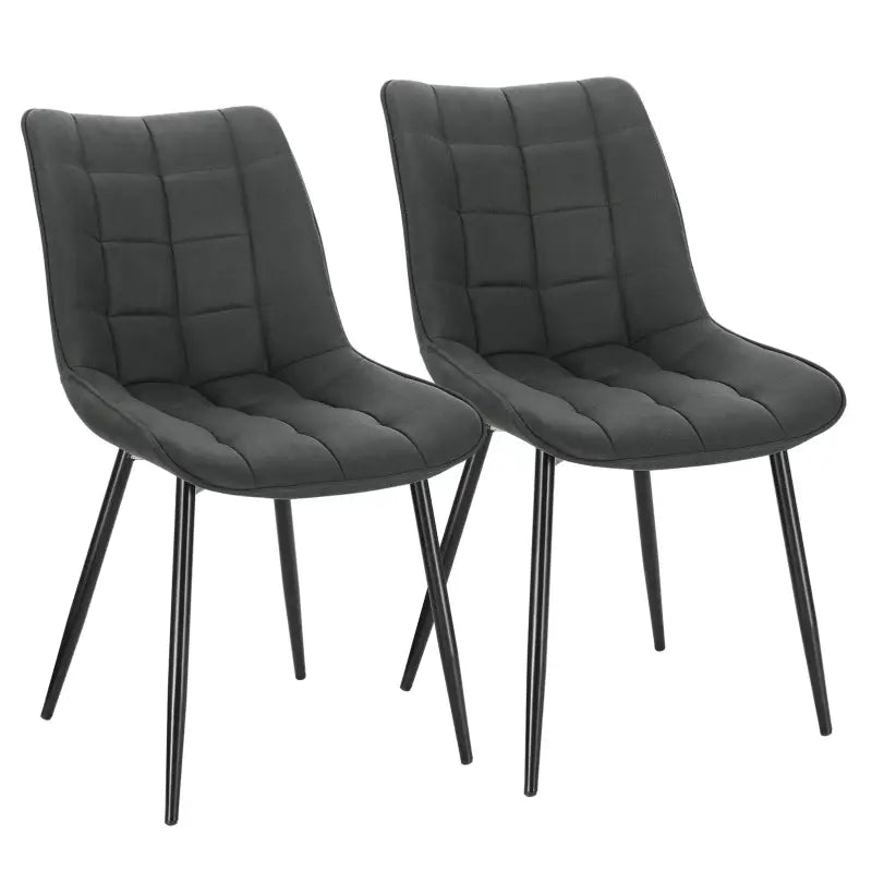 Set van 2 BukkitBow eetkamerstoelen met leren, stoffen en fluwelen zitting, metalen poten en ergonomisch ontwerp, zithoogte 46cm.