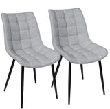 Set van 2 BukkitBow eetkamerstoelen met leren, stoffen en fluwelen bekleding, metalen poten en ergonomisch ontwerp, zithoogte 46 cm.