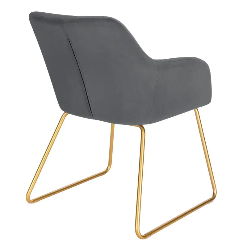Twee BukkitBow fluwelen eetkamerstoelen met goudkleurige metalen poten en comfortabele zithoogte van 48,5 cm.