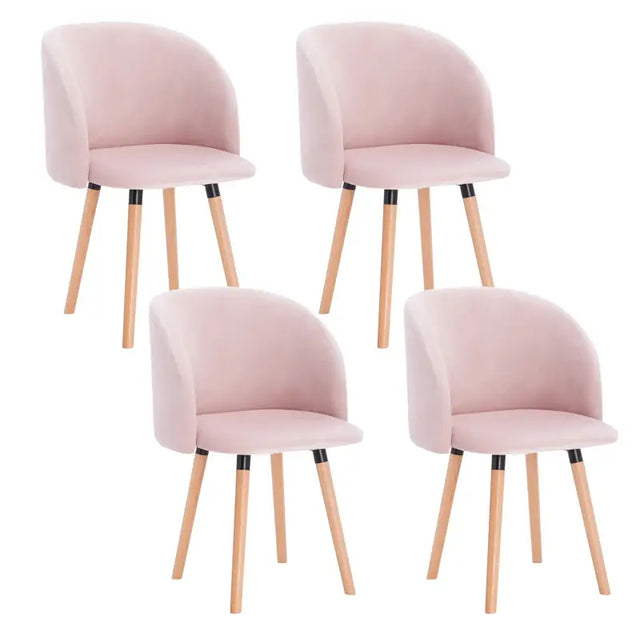 Set van 4 BukkitBow fluwelen eetkamerstoelen met massief houten frame, ergonomisch design en zithoogte van 47 cm.