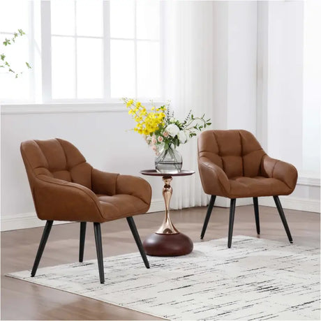 BukkitBow vintage bruine eetkamerstoel met armleuningen, imitatieleren bekleding, metalen frame en schuimvulling, draagvermogen 150 kg.